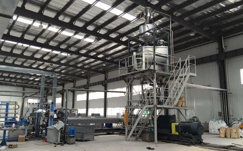 Industrial plastic processing equipment inside the Cherein factory